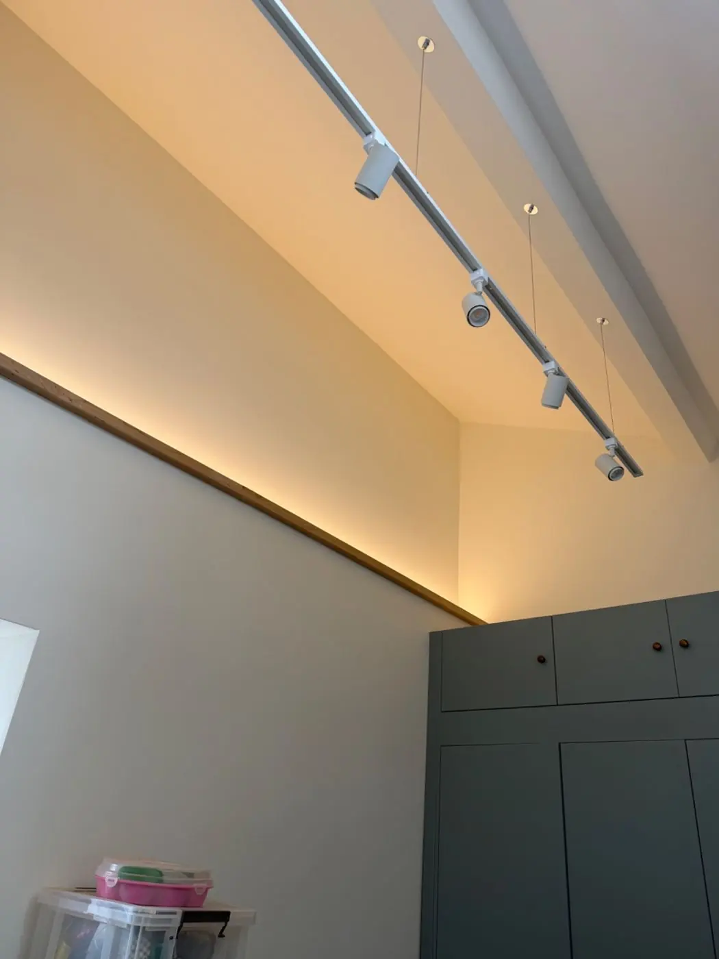 Track lighting and concealed feature lighting in a domestic interior