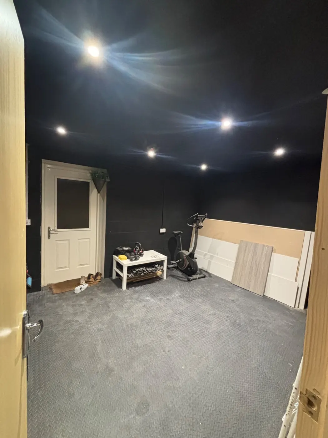 Recessed spotlights installed in a domestic garage and utility area